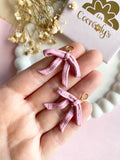 Pampilles BONNIE noeud effet ruban rose poudré - boucles d’oreilles interchangeables