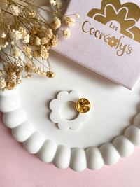 Pin's à lunettes - fleur blanche dorée