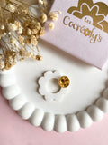 Pin's à lunettes - fleur blanche dorée