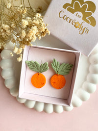 Puces d’oreilles Orange
