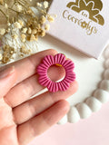 Pin's à lunettes - fleur rose tropical