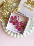 Pampilles NAÏA réversibles rose intense, recto métallisé coeur pailleté et verso motifs à pois blancs - boucles d’oreilles interchangeables