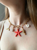 Collier MAUDE étoile de mer corail - avec 5 charm's interchangeables