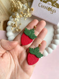 Puces d’oreilles Fraise