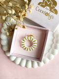 Pin's à lunettes - fleur blanche dorée