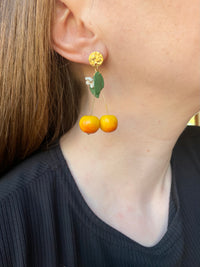Puces d’oreilles cerises jaunes