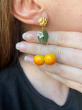 Puces d’oreilles cerises jaunes